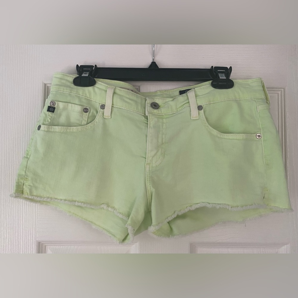 AG low rise denim shorts. Fluorescent green.